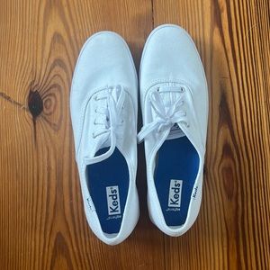 Keds.  Never been worn.  Size 8